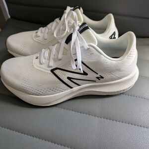 New Balance Women's Black and White Sneakers (Sold)